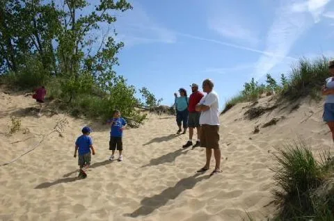 Family walking on sand