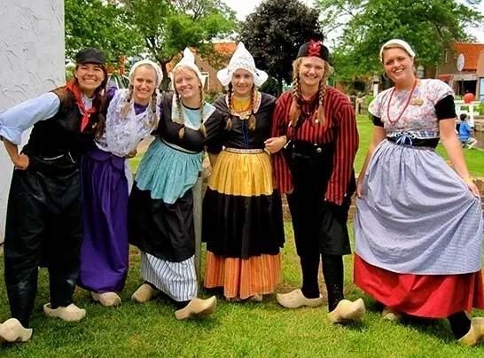 A group of young women wearing costumes